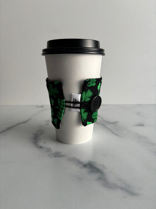 Clovers on Black - Reusable Coffee Sleeve