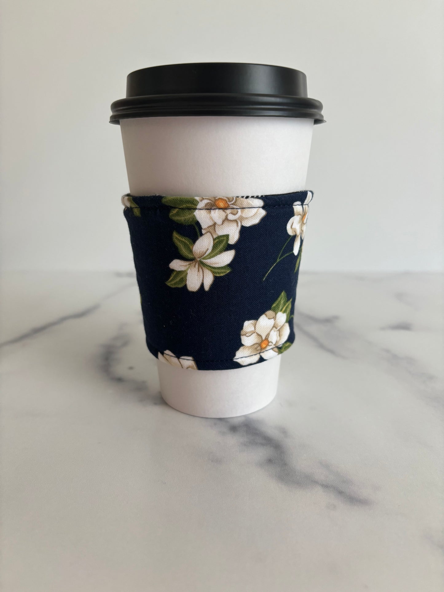 Magnolias on Navy - Reusable Coffee Sleeve