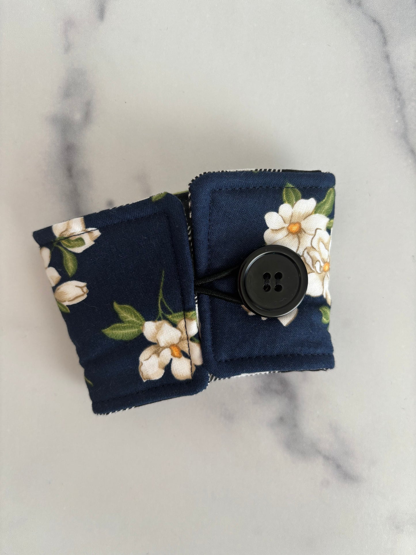 Magnolias on Navy - Reusable Coffee Sleeve