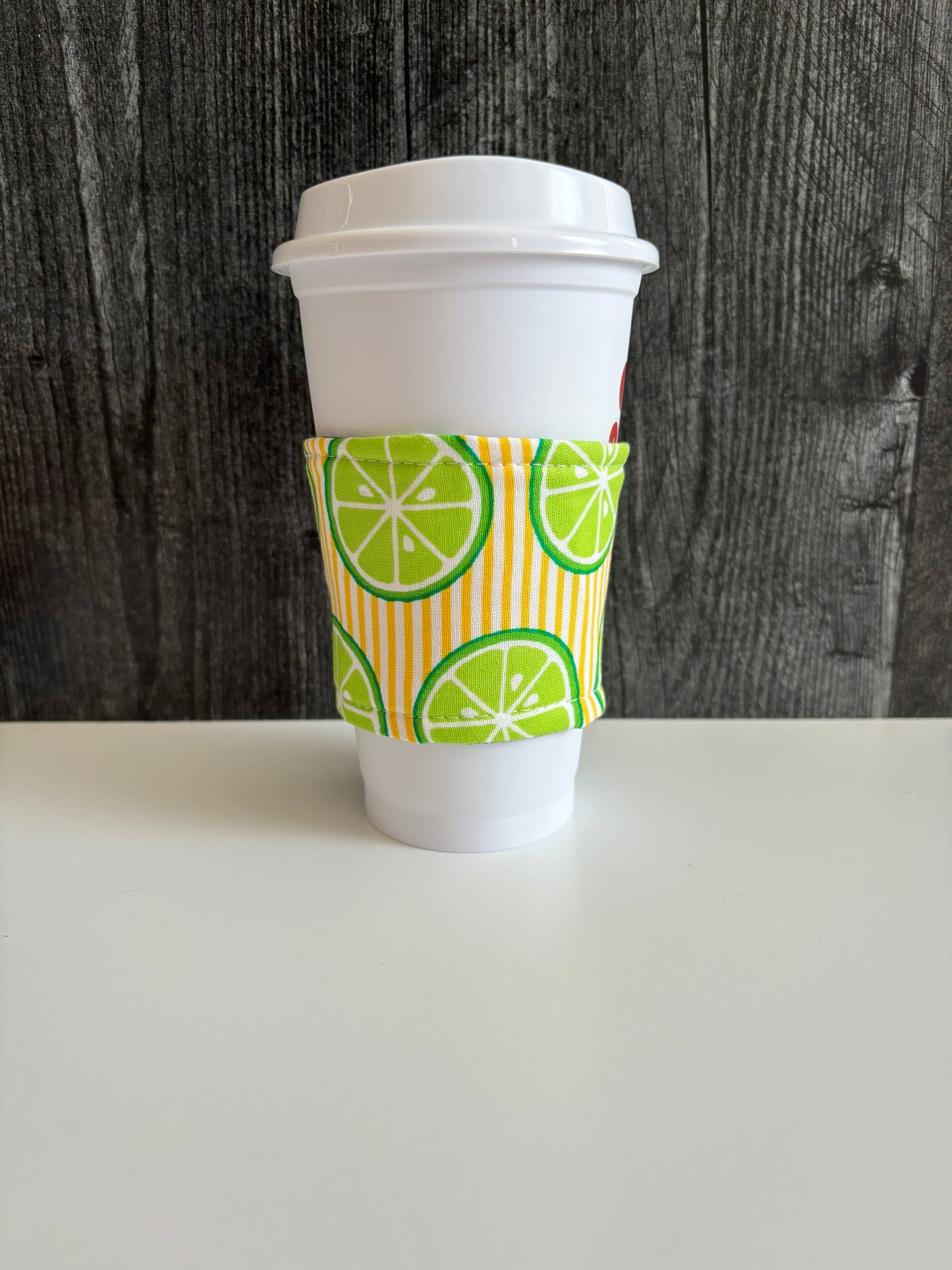 Limes on Yellow Stripes - Reusable Coffee Sleeve